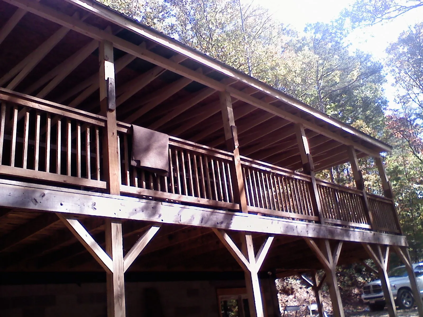 Timber framing under a new elevated porch and deck — Roof Leak Repair in Vona by Roofing Brothers